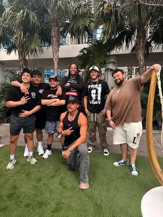 Group photographed outdoors at a South Florida community event